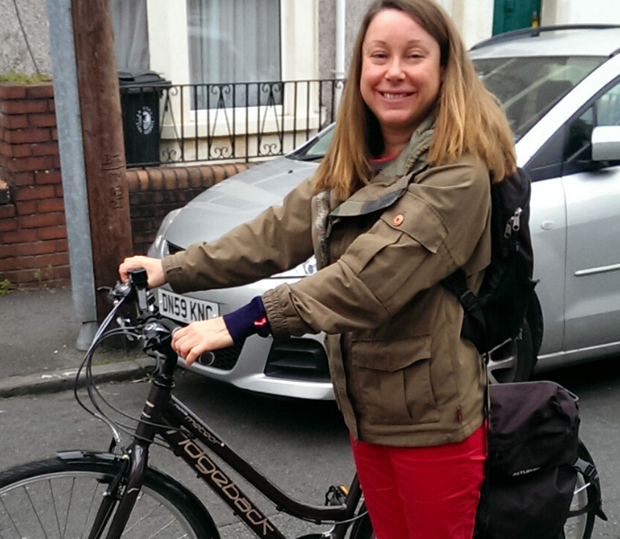 Young lady borrowing a loan bike