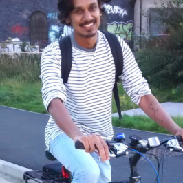 Young man borrowing a loan bike