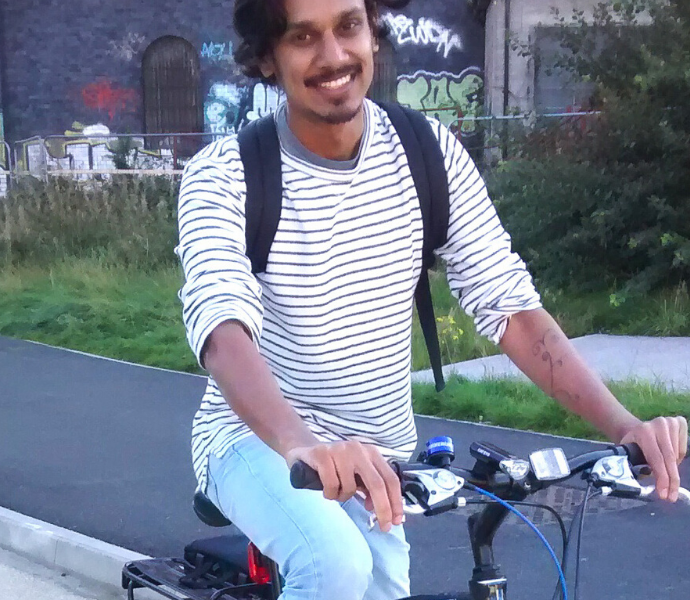 Young man borrowing a loan bike