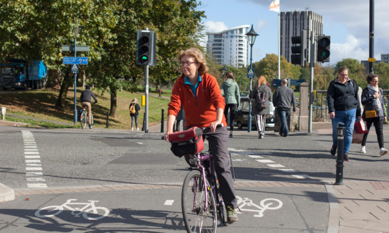 Women cycling on segregated cycle lane on Bristol Bridge