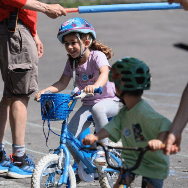 Young girl doing cycle skills on a bike
