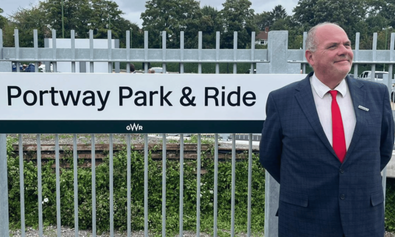 Photo of Councillor Don Alexander opening Portway train station in Bristol