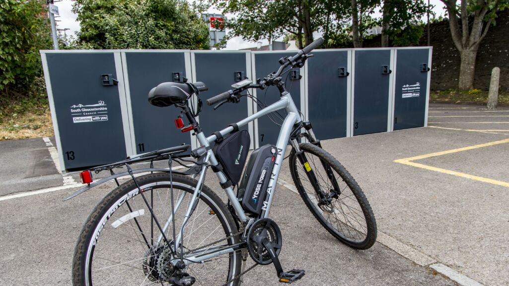 photo of bike being locked up at new bike lockets at Yate train station