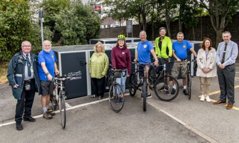 people outside yate station with the new cycle lockers